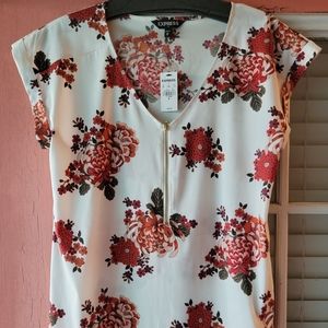 Express women's shirt. Cream/red Floral. Size M
